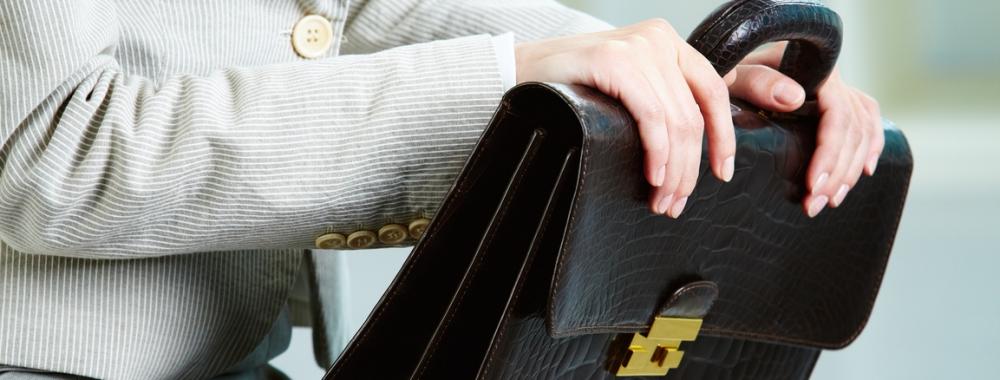 Briefcase in hands.jpg